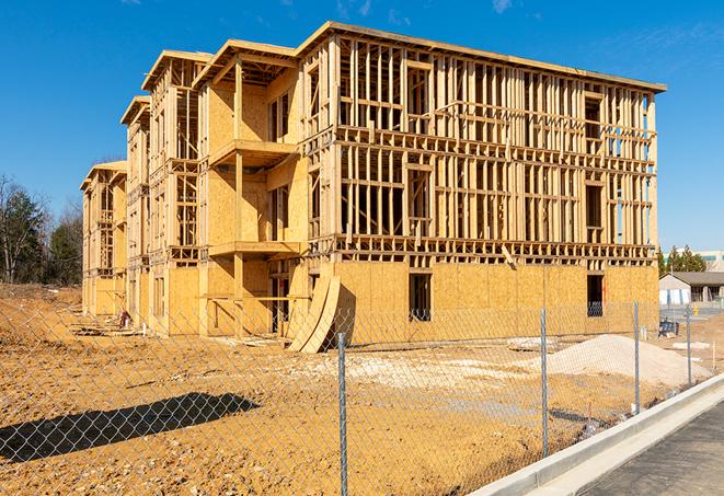 a snapshot of temporary chain link fences protecting a large construction project from unauthorized access in Eagle